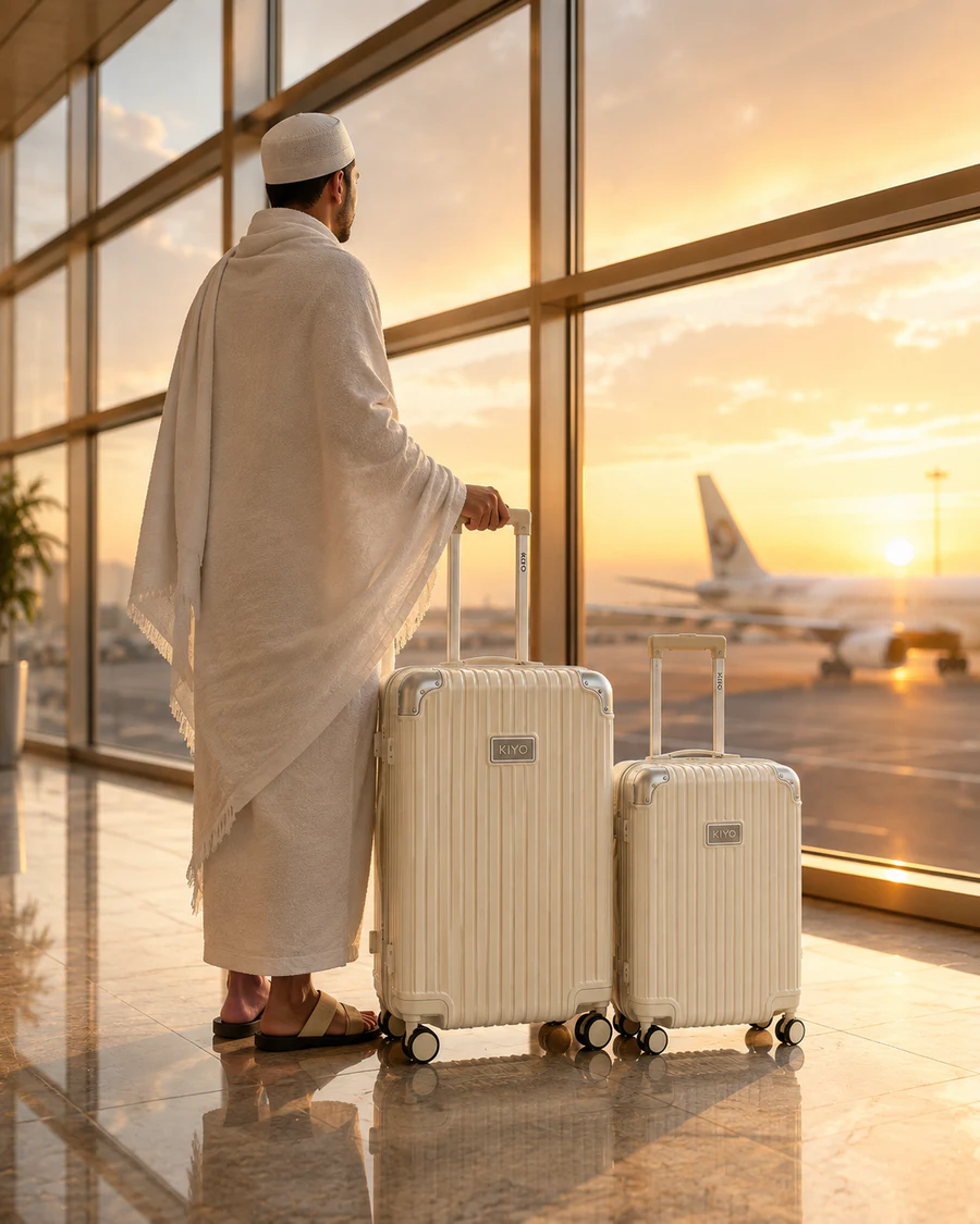 UMRAH traveller with a coordinated cream luggage set at an airport